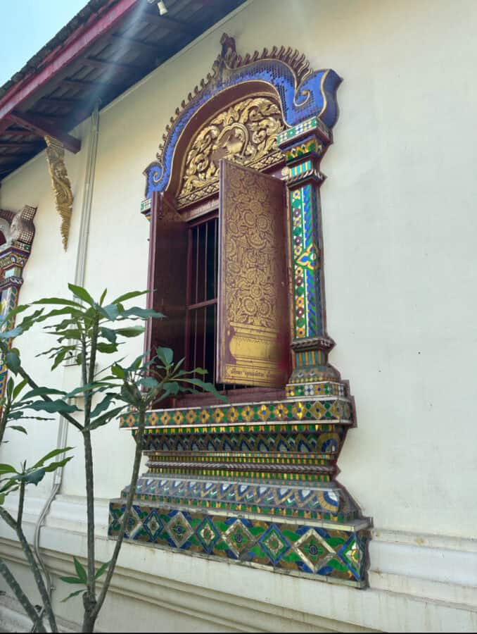 Decorated window at the side of a temple in the Grand Palace, Bangkok. One of the temples we saw before my heat-induced collapse