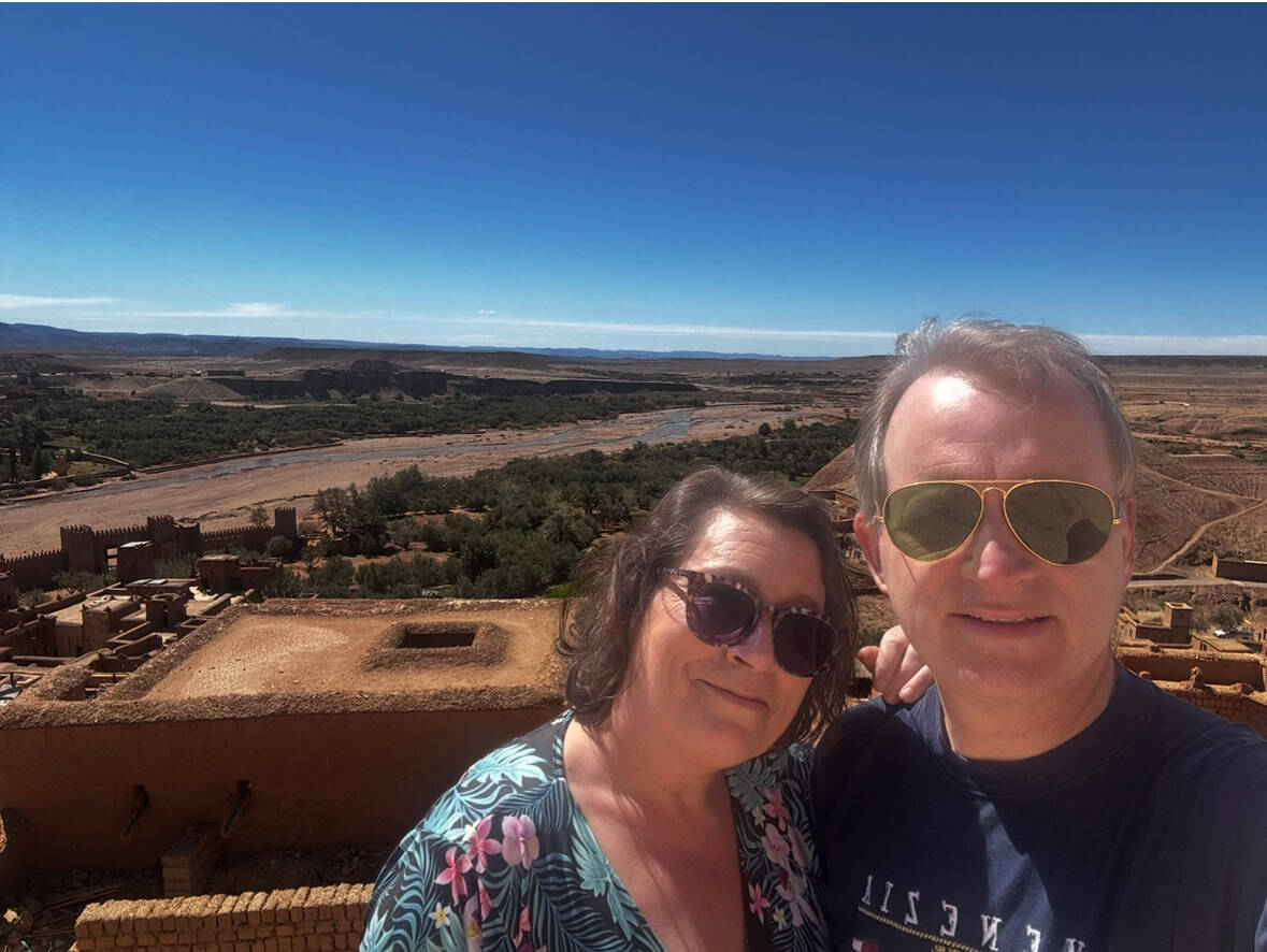 Beautiful Moroccan desert landscape with historic architecture and river views.