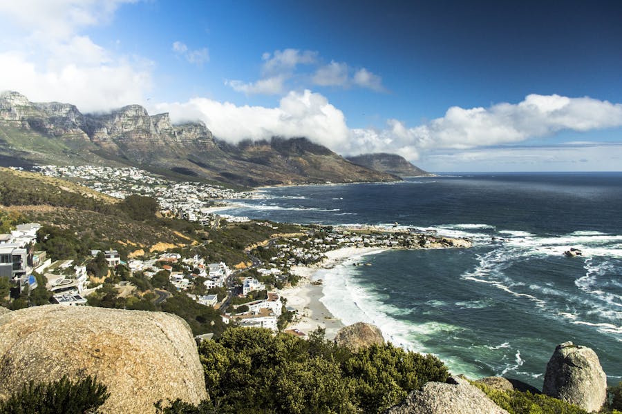 Breathtaking view of Cape Town's coastline with ocean, mountains, and beaches.