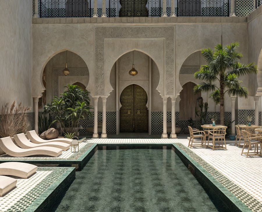 Stunning Moroccan riad features a serene pool and traditional décor in Marrakech.