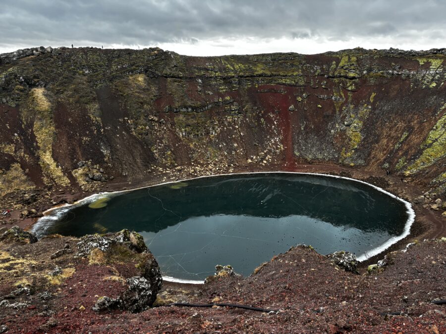Green-blue volcano lake inside Kerid volcano crater.