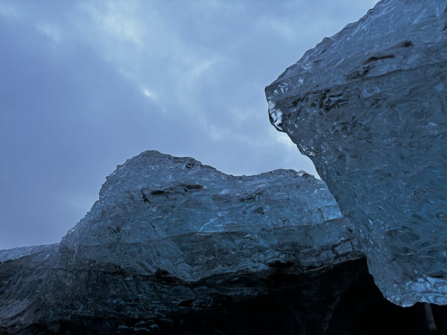 Two big chunks of blue ice, photographed from below