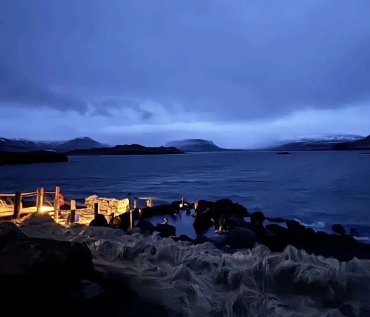 Partly lit thermal baths in Iceland at dusk