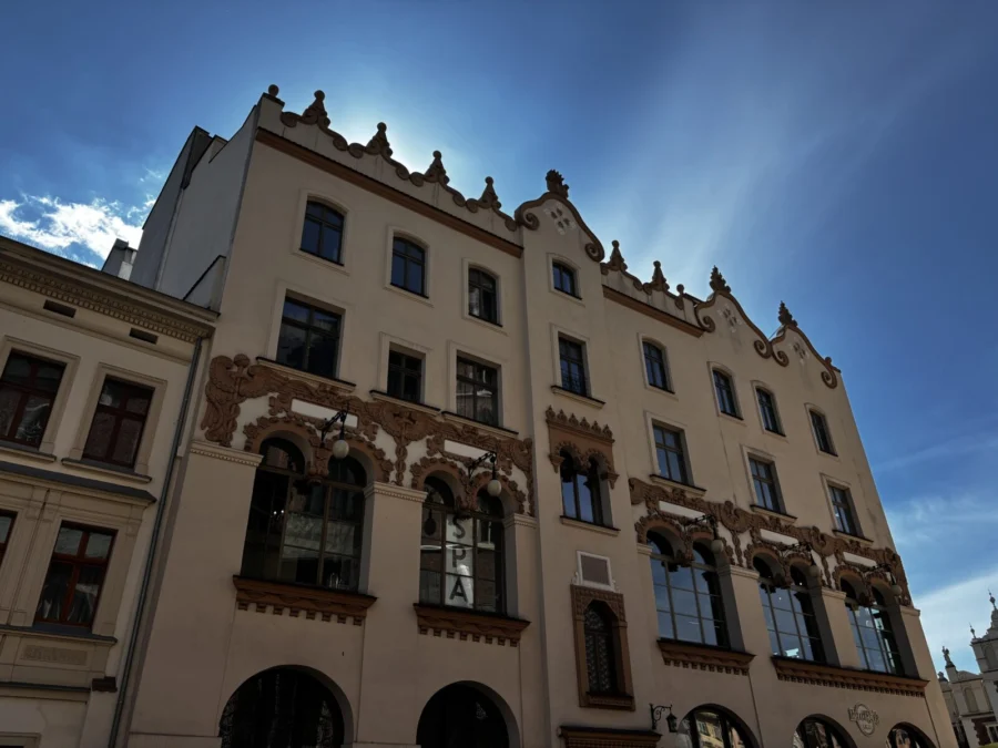 Photo: Tales From The Road Ahead. Beautifully decorated colourful buildings in Rynek Główny, Kraków - the main square.