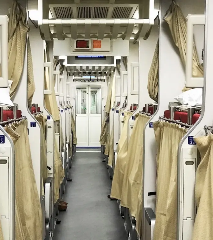 Thailand sleeper train from Bangkok to Chiang Mai. All the beds are made, all the curtains drawn.