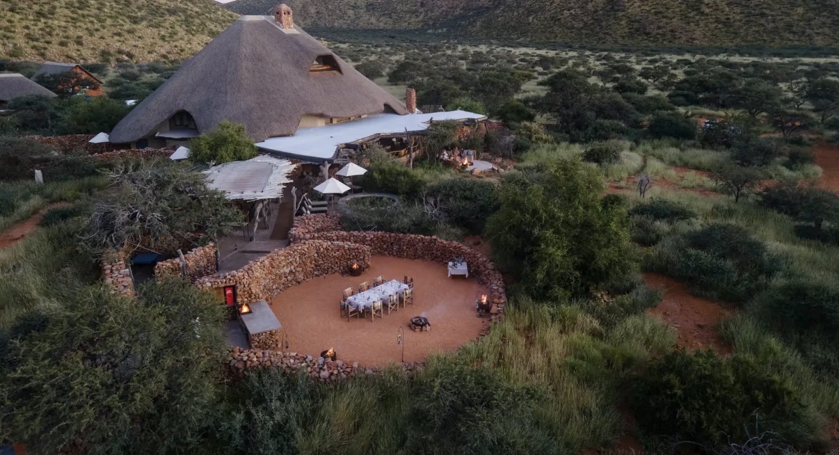 Set tables in a boma next to a safari lodge in South Africa